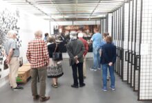 a group of people standing in a room