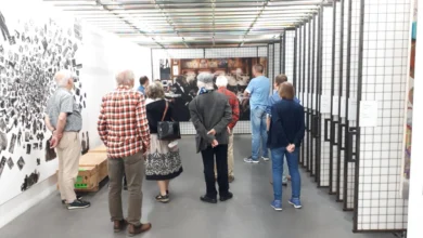 a group of people standing in a room