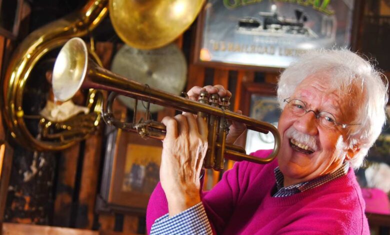 a man playing a trumpet