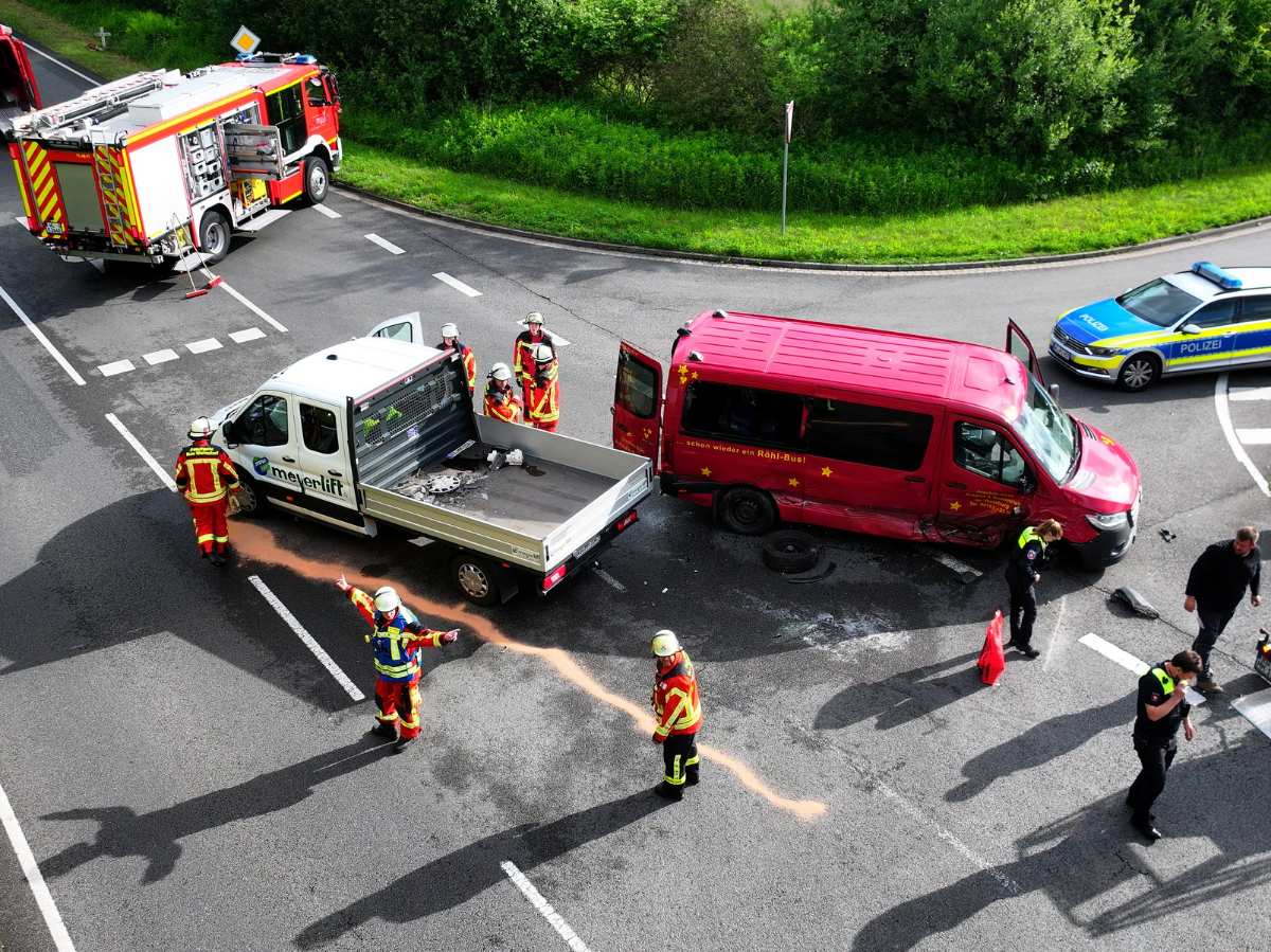 a group of firefighters working on a car accident