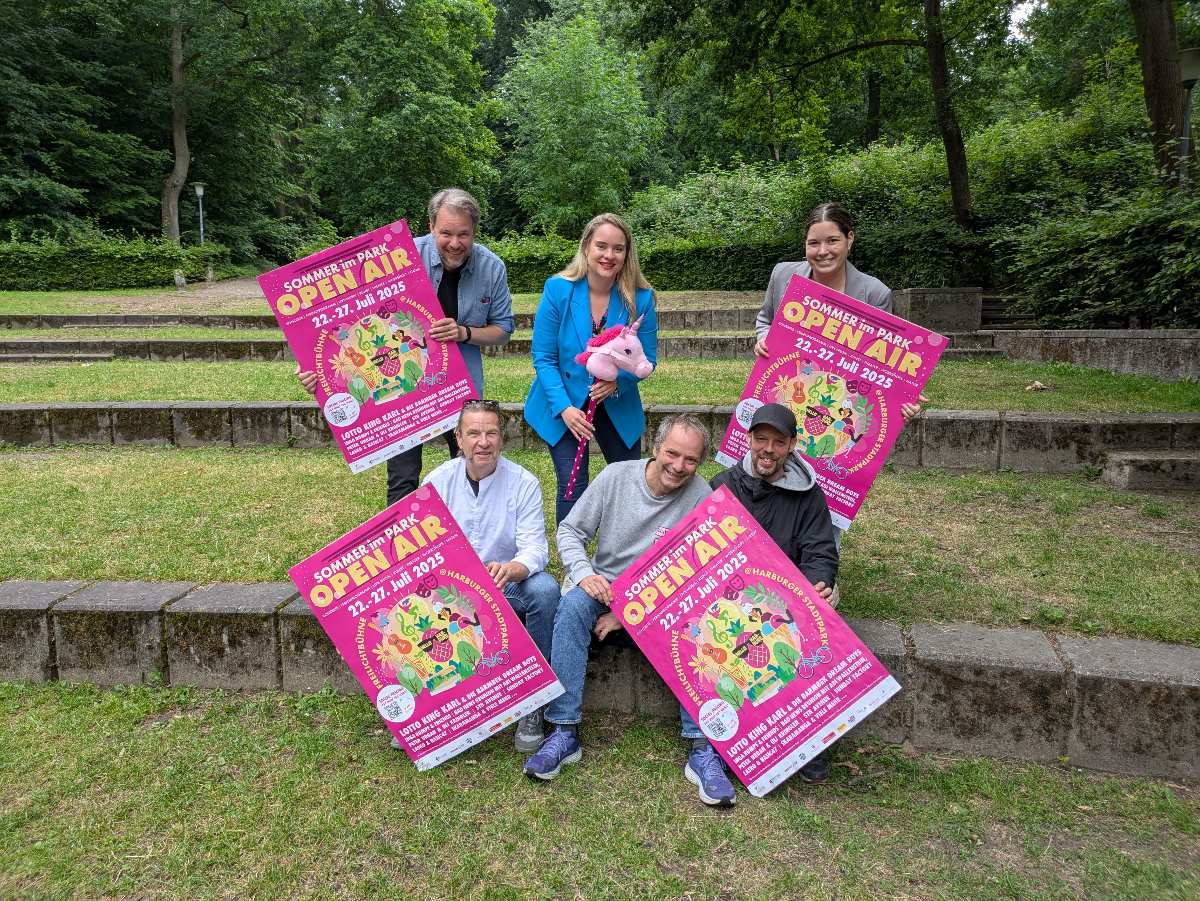 a group of people holding up signs