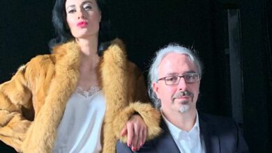 a man and woman posing for a picture
