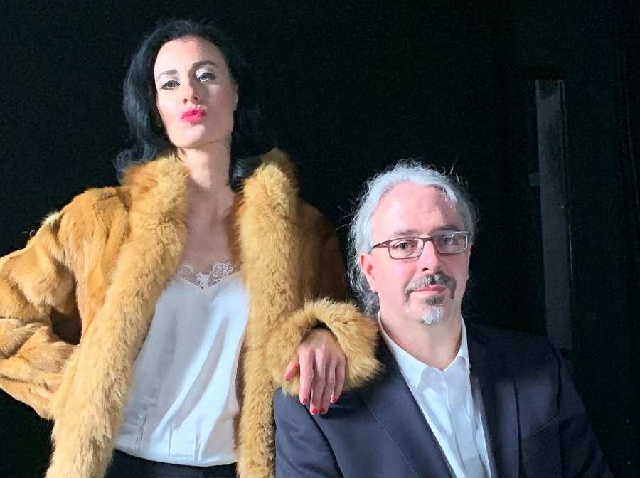 a man and woman posing for a picture