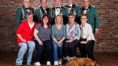 a group of people posing for a photo