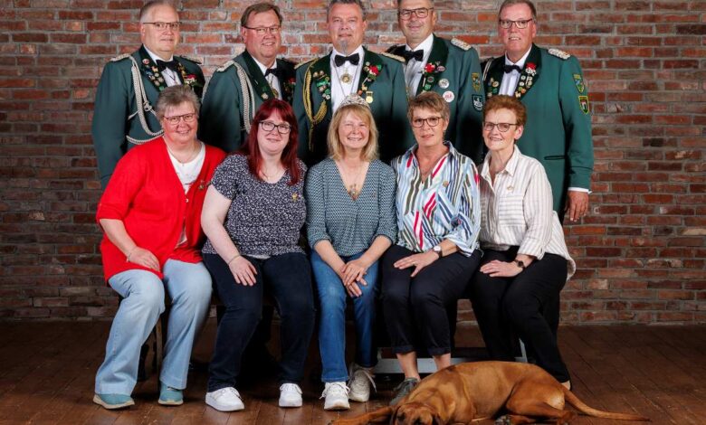 a group of people posing for a photo