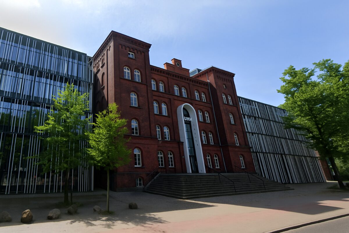 a building with trees in the front