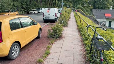 a road with cars parked on it