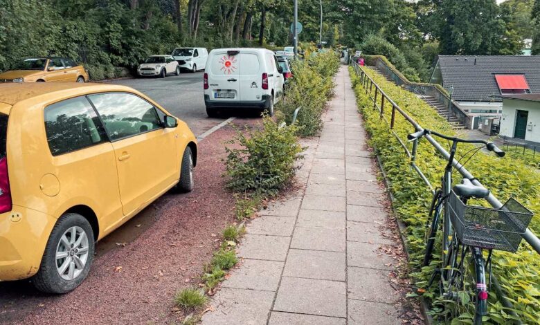 a road with cars parked on it