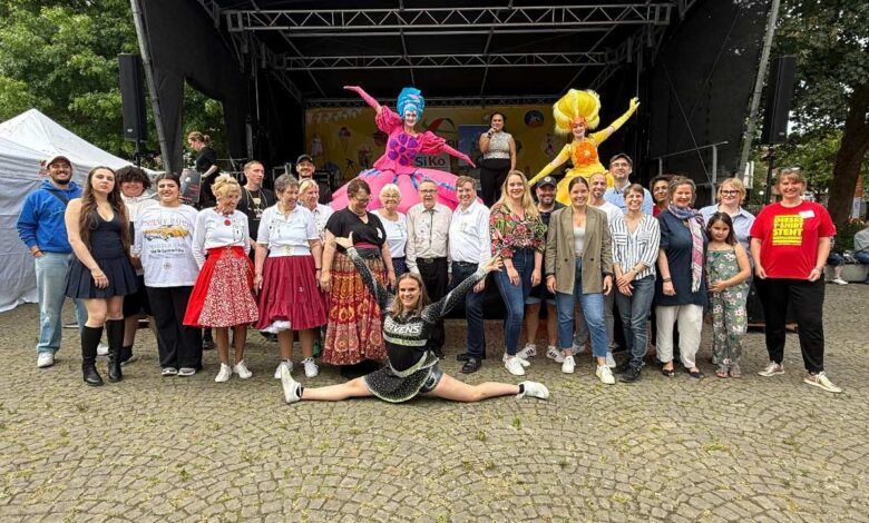a group of people posing for a photo