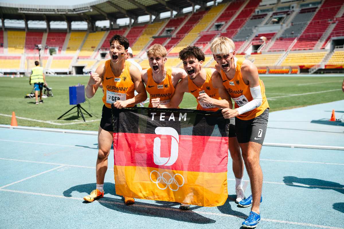 a group of men holding a flag