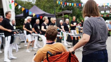 a group of people playing drums