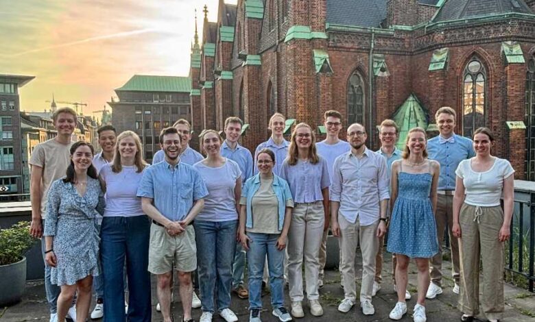 a group of people posing for a photo