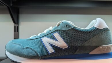 a blue and white sneaker on a shelf