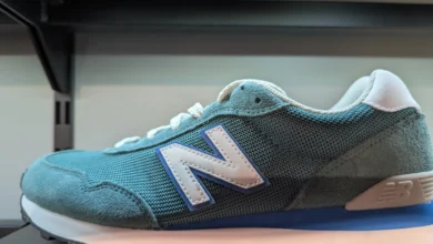 a blue and white sneaker on a shelf