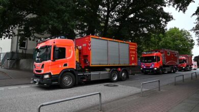 a red truck on the road