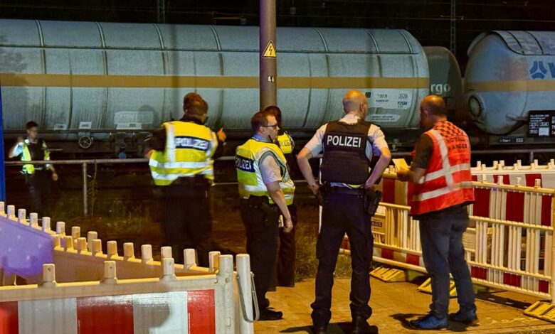 a group of police officers standing on a platform