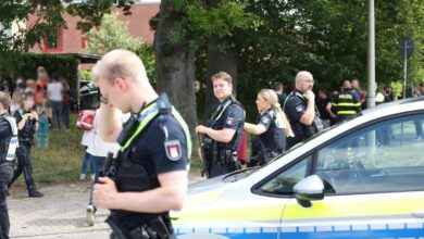 a group of police officers standing in a line