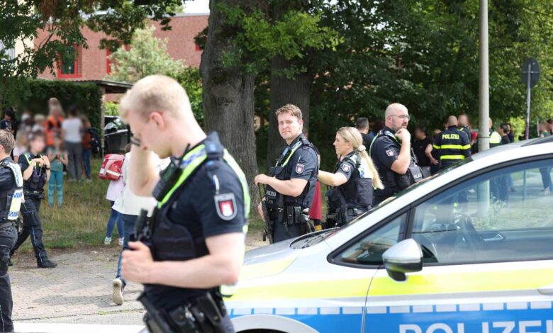 a group of police officers standing in a line