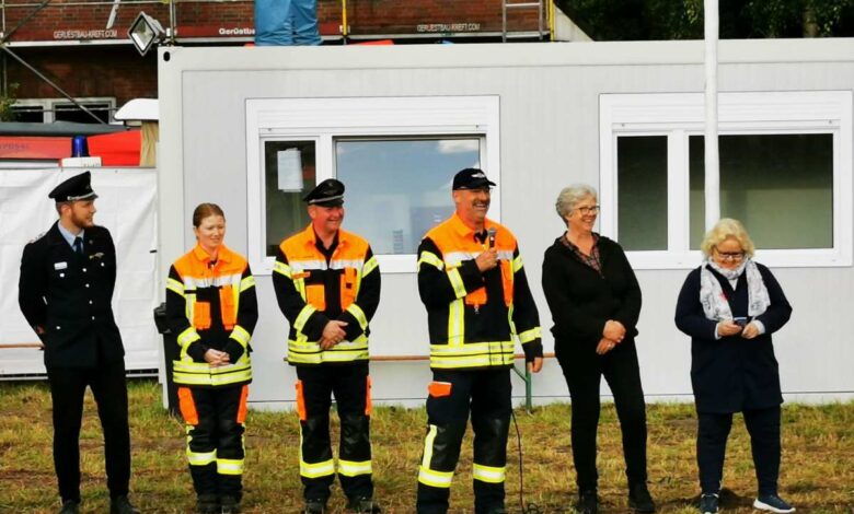 a group of people standing in a line