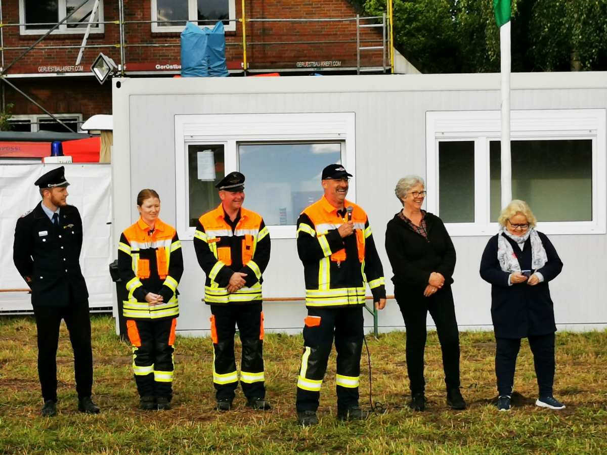 a group of people standing in a line