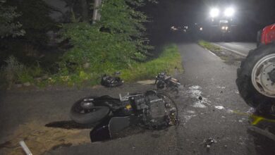 a motorcycle on the road at night