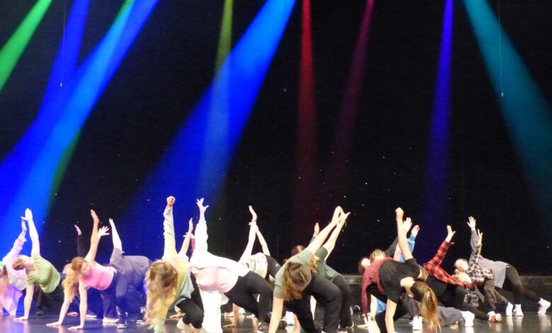 a group of people on a stage