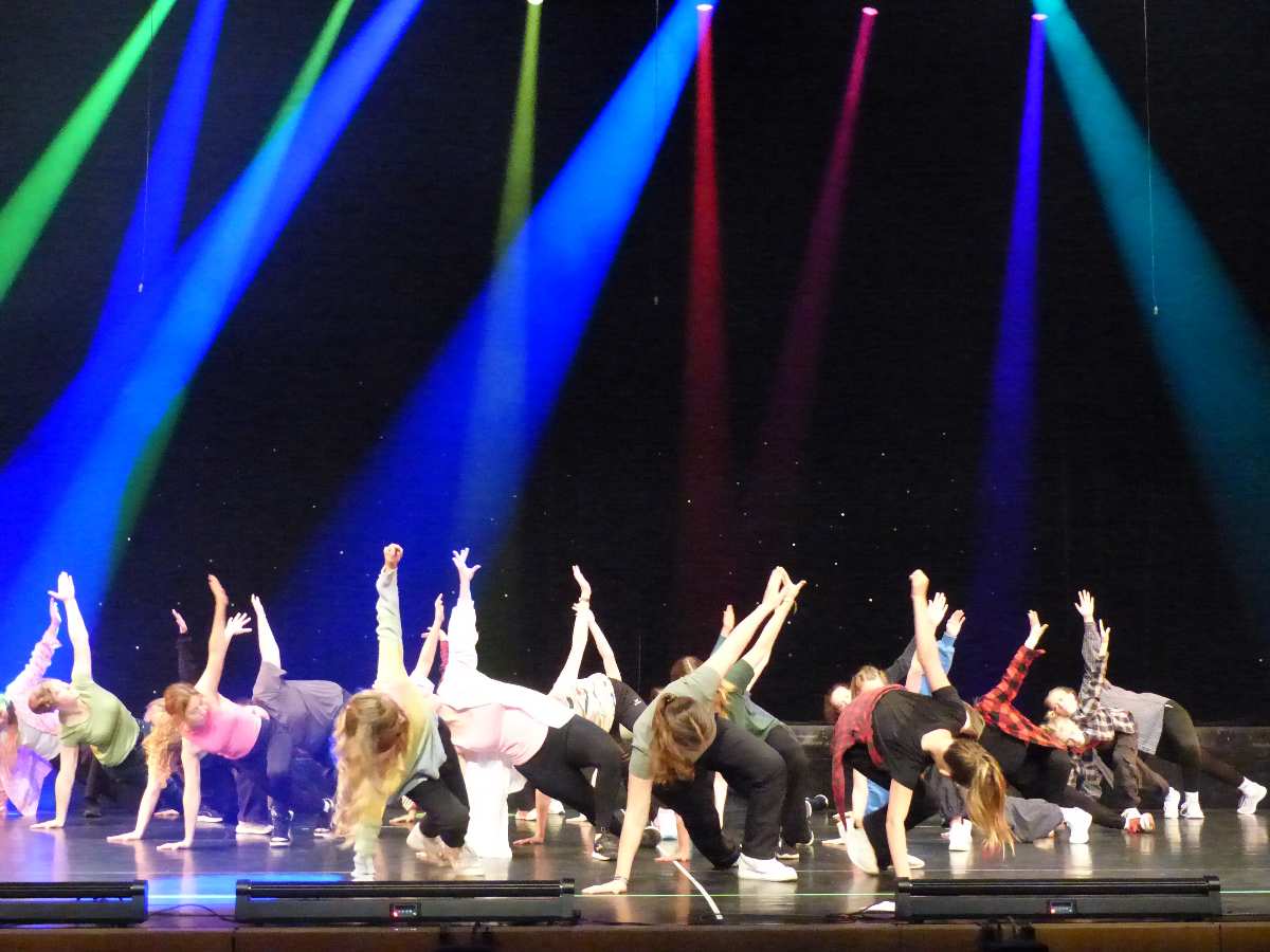 a group of people on a stage