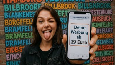 a woman holding a phone with her tongue out