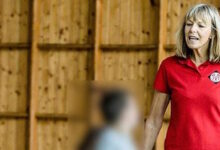 a woman in a red shirt