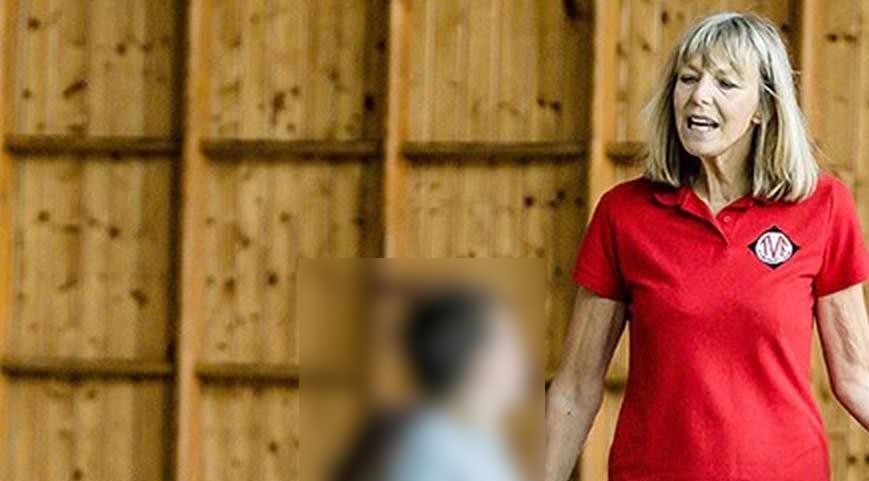 a woman in a red shirt
