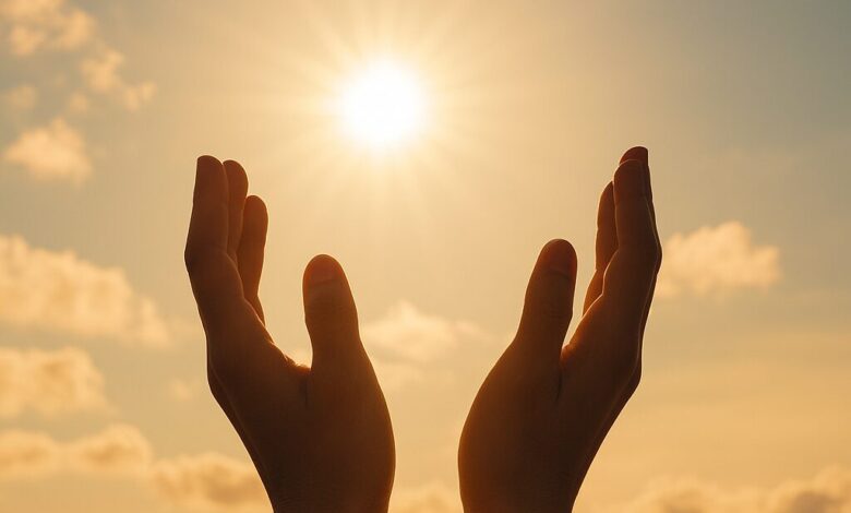 a hands reaching up to the sky
