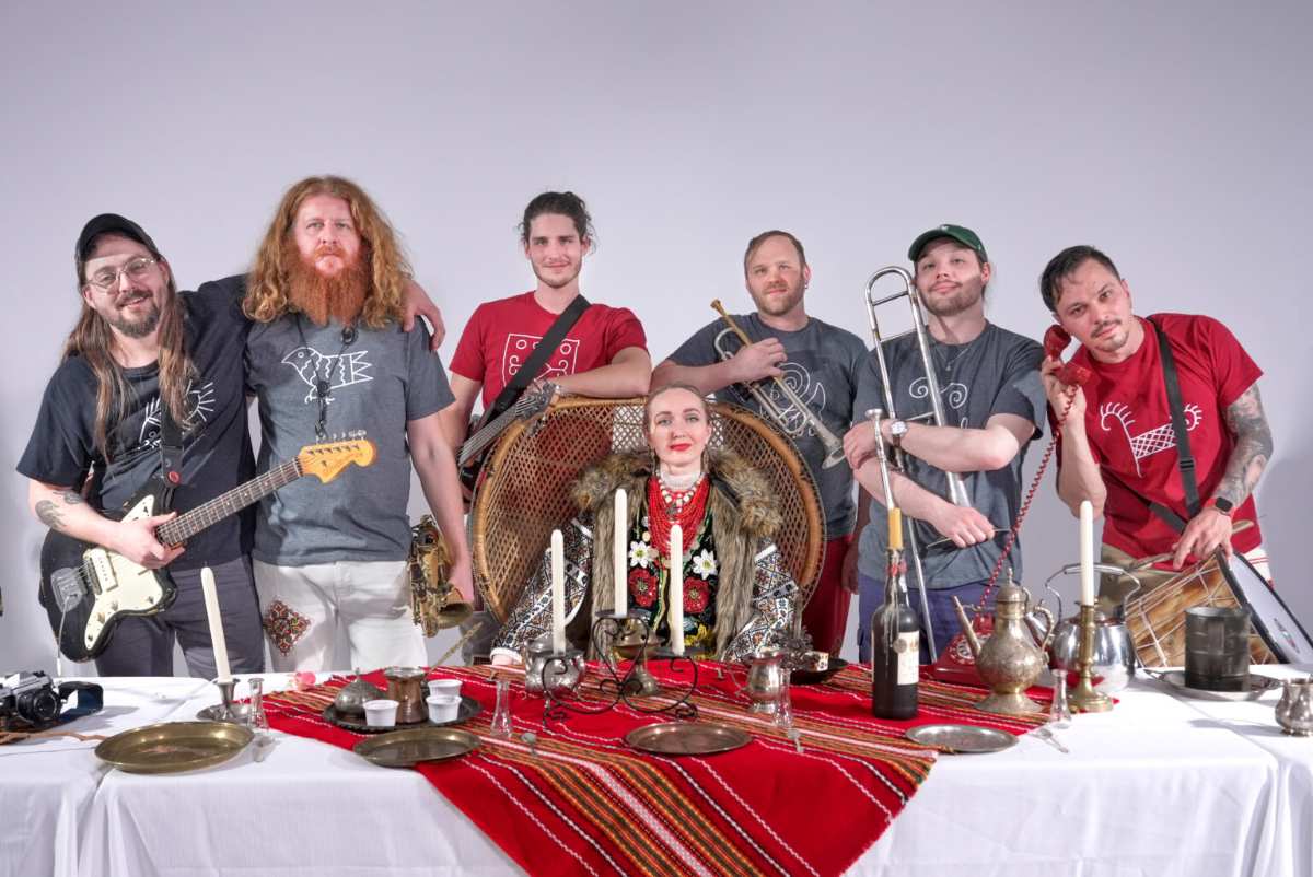 a group of people posing for a photo