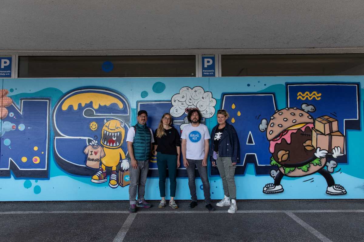 a group of people posing for a picture