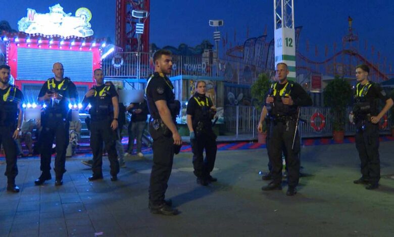 a group of police officers standing in a line