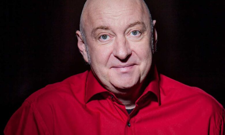 a man in a red shirt