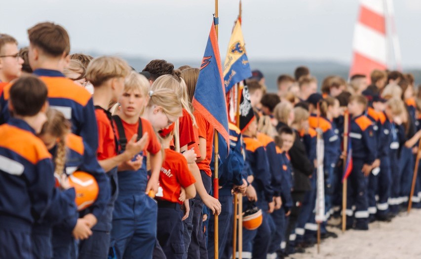 a group of people in uniform standing in a line