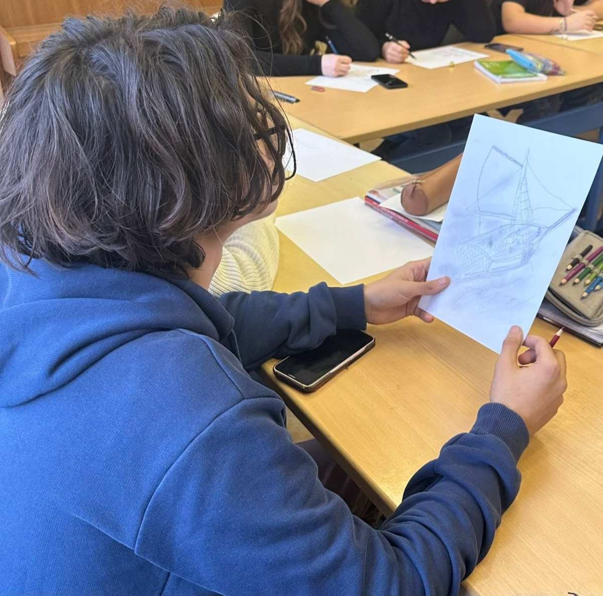 a person holding a piece of paper