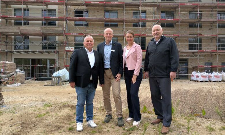 a group of people standing in front of a building