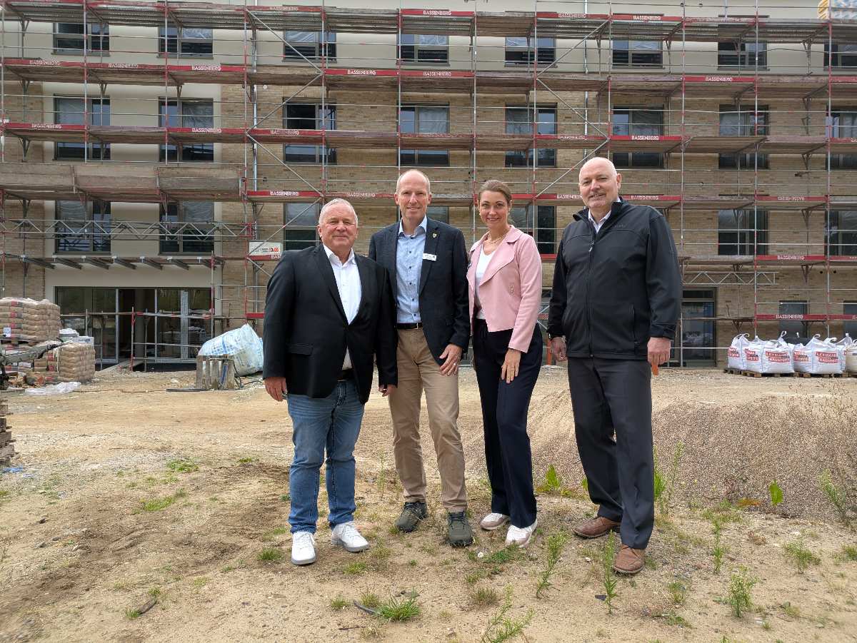 a group of people standing in front of a building