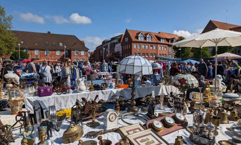 a group of people at a flea market