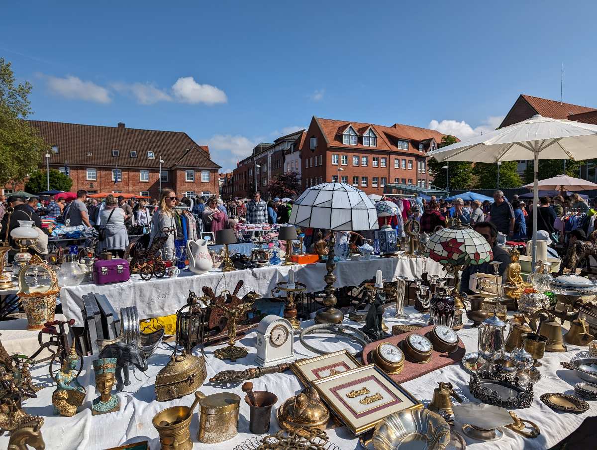 a group of people at a flea market