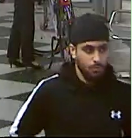 a man in a black hat