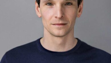 a man in a blue shirt
