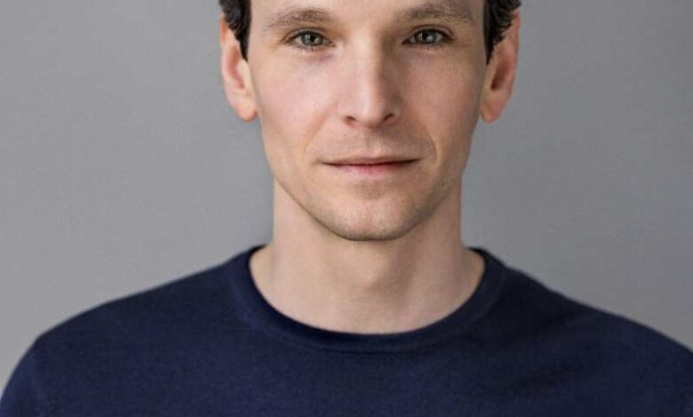 a man in a blue shirt