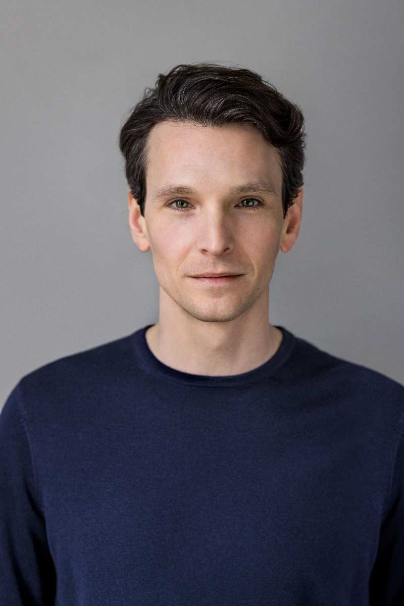 a man in a blue shirt