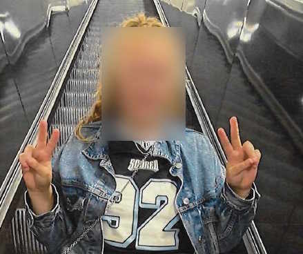 a person on an escalator